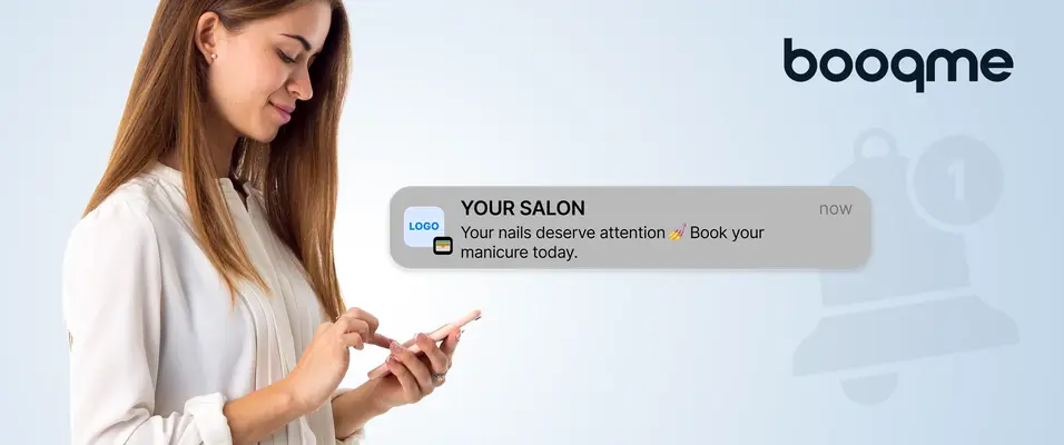 Woman reading a push notification from a loyalty card on her mobile phone